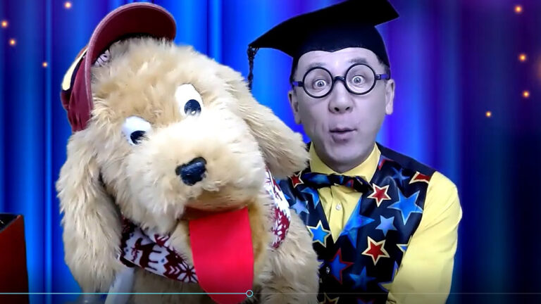 Hilarious children's magician Professor Potty and his cute furry puppet dog Dexter on a Zoom virtual show, really popping out of the screen.